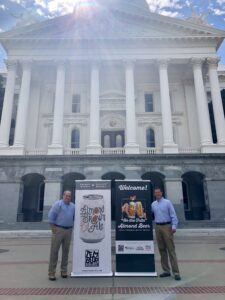 Dom Camou (left) and Lucas Schmidt (right) presenting their Almond Leadership fundraising project on the steps of the California State Capitol building. 
