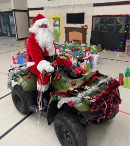 Grow West North Valley Sales Manager Gary Silveria has been dressing up as Santa since the inception of the toy drive to deliver Christmas gifts to the children of Walnut Grove Elementary. 